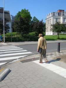 foto blinde persoon op straat