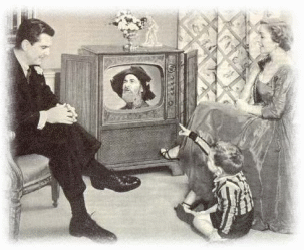 vader, moeder en zoon kijken samen tv