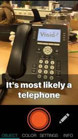 foto van een telefoon: object geselecteerd: tekst: it's most likely a telephone