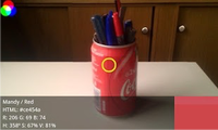 Foto van een blikje Cola waarvan de rode kleur wordt herkend